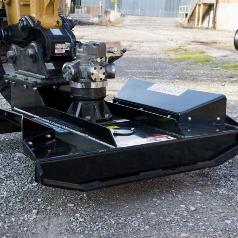 blue diamond brush cutter on the ground ready to be used