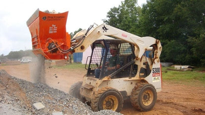 ezg hog crusher in action on a bobcat