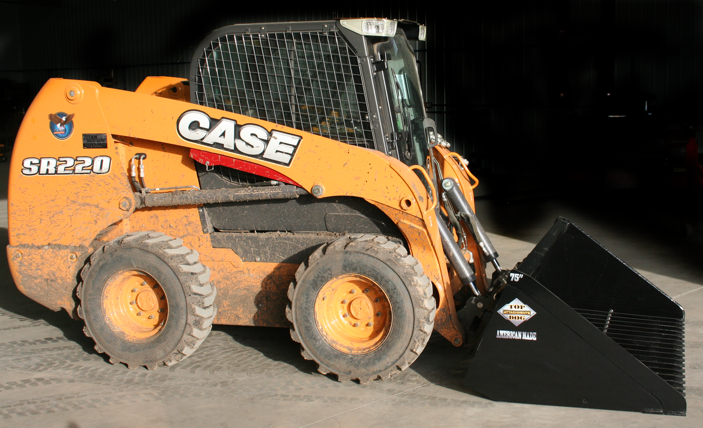 case-skid-steer-with-the-firewood-bucket-attachment-side-view