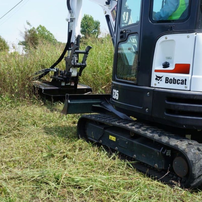 bobcat mini x cutting 3 foot grass