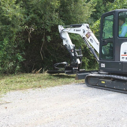 mini x brush cutter off the side of the road