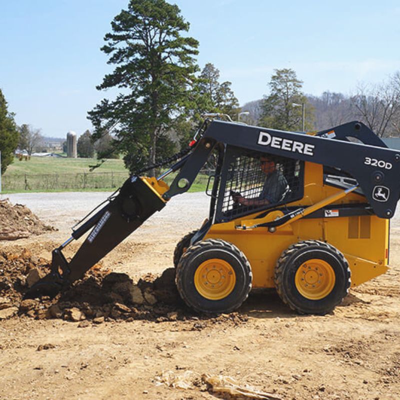 John Deere Skid Steer with Blue Diamond Backhoe Attachment.