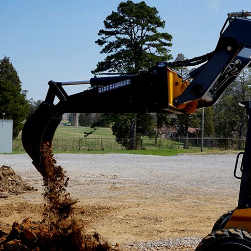 Blue Diamond Backhoe Attachment in Skid Steer