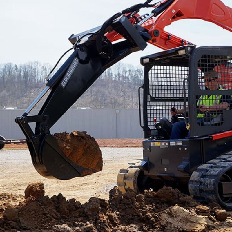 Skid Steer with Blue Diamond Backhoe Attachment