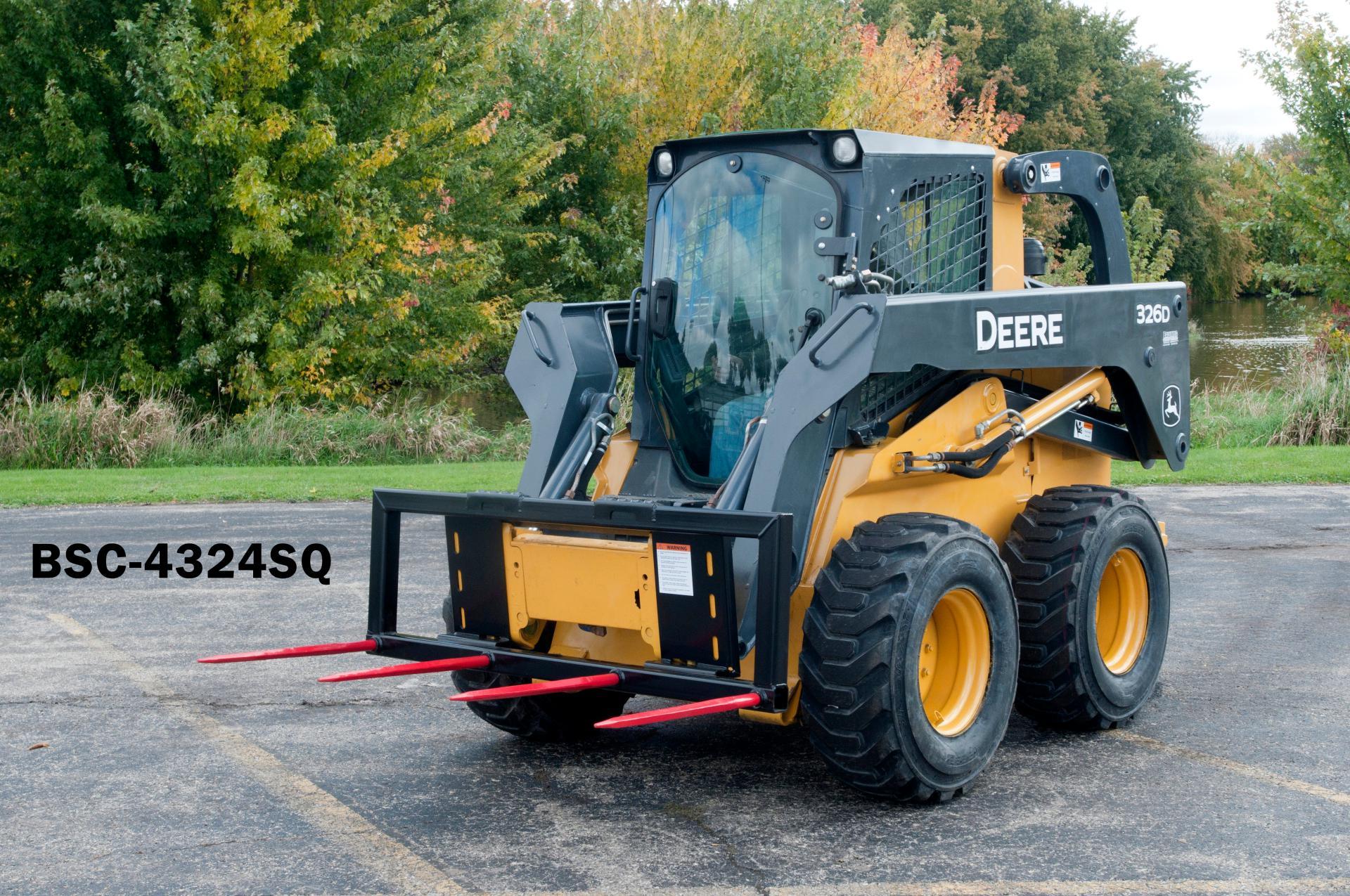 john deere skid steer in action with the Bale Spear Carriages Berlon Industries 