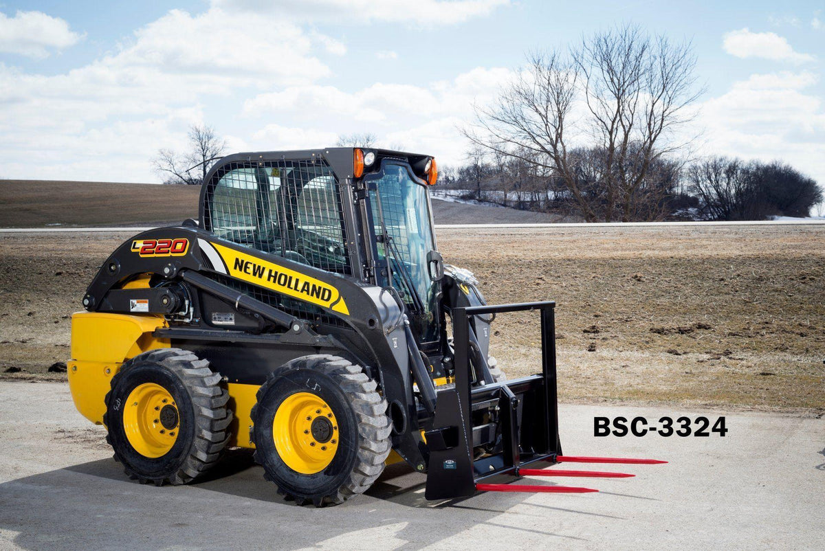 skid steer with the berlon industries bale spear in action
