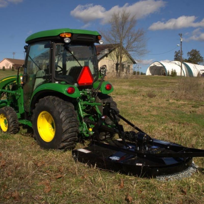 tractor with blue diamond heavy duty round back cutter  