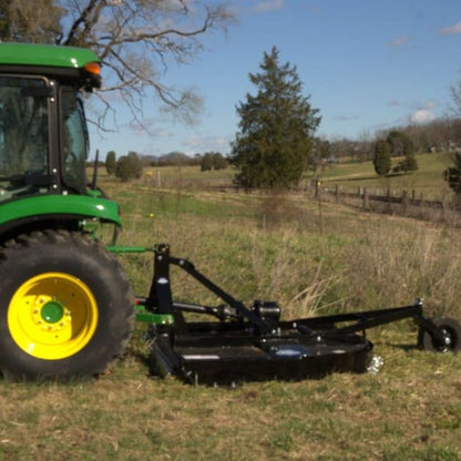 tractor with heavy duty round back cutter in action  