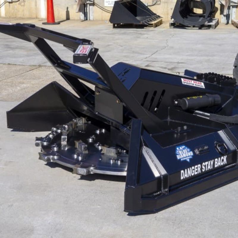 skid steer with blue diamond disc mulcher attachment  