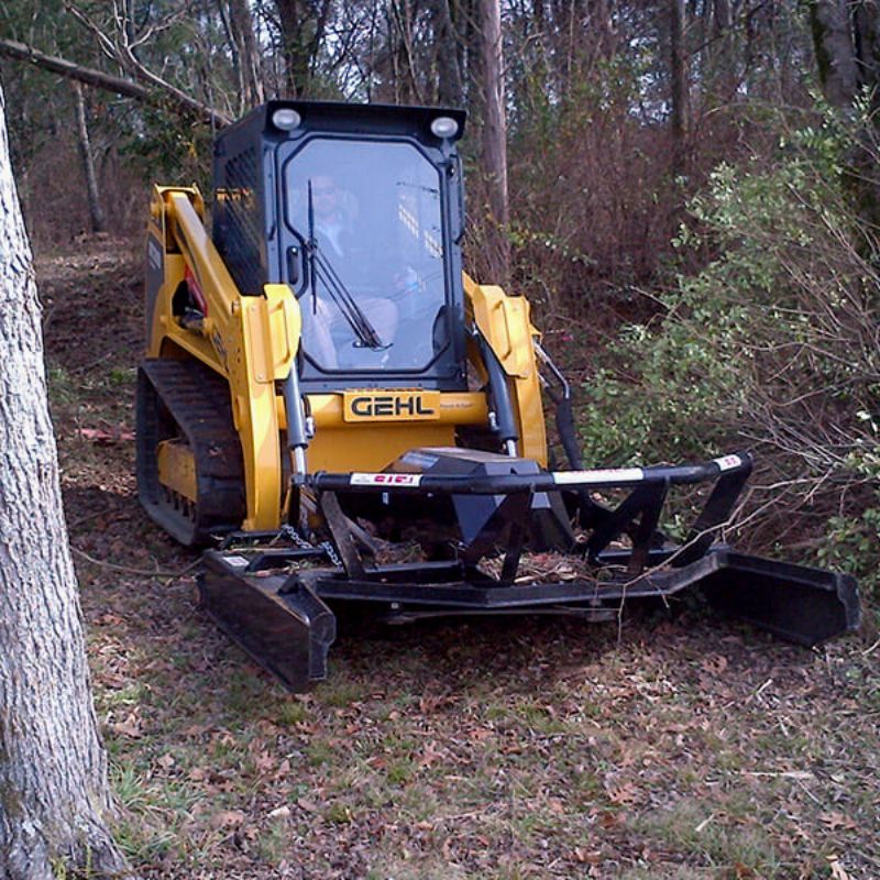 Gehl with the Brush Cutter Extreme Duty Open Front by Blue Diamond attachments