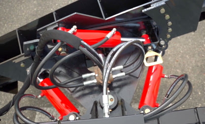 up close of the cylinders of the dozer blade of mclaren skid steer attachment