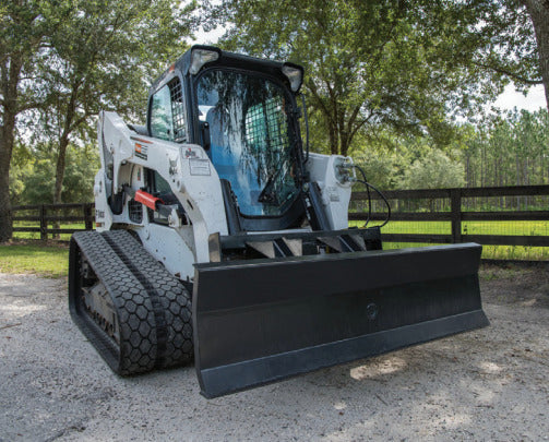 skid steer with the 4 way dozer blade for land clearing from mclaren