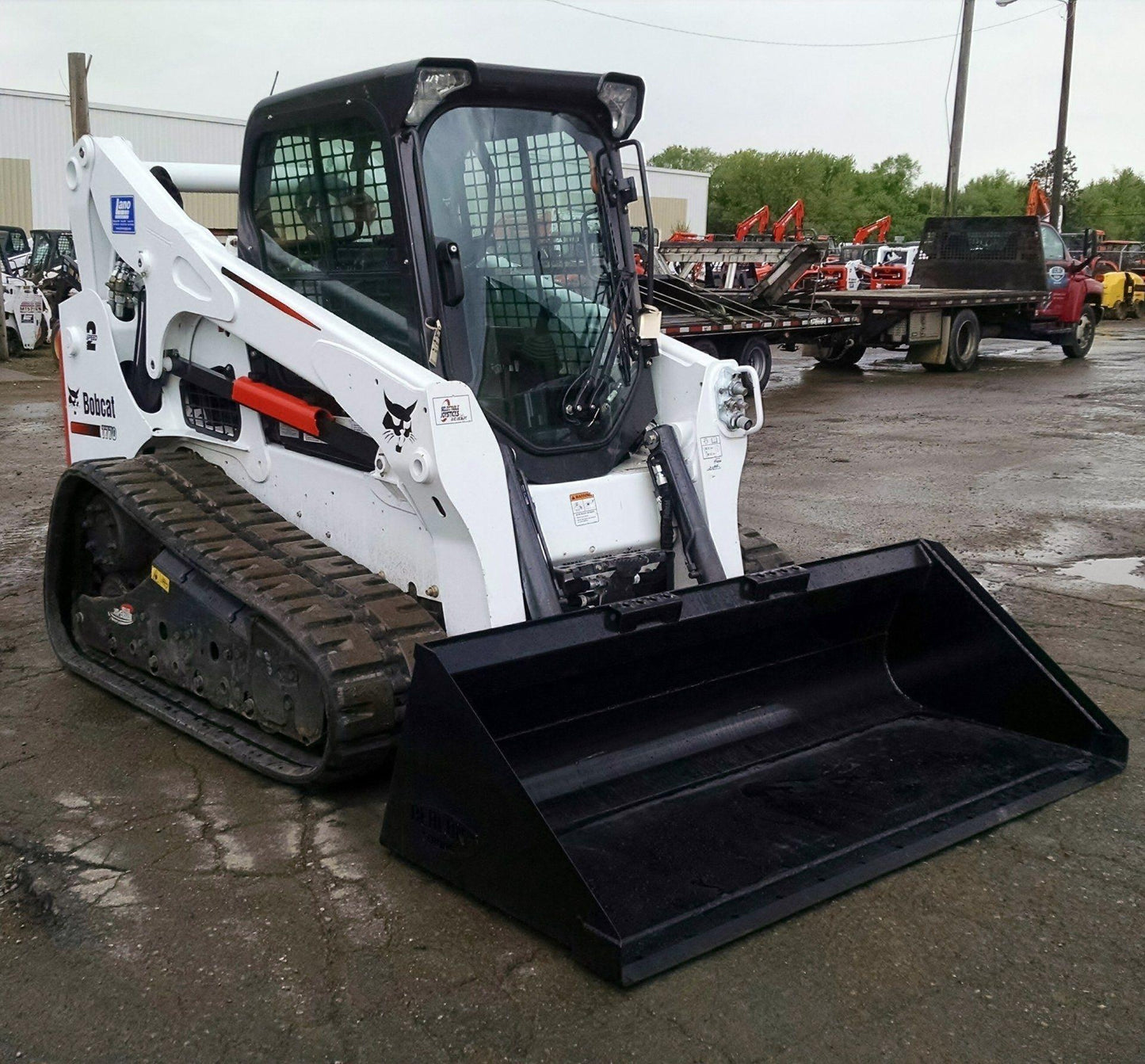 Bobcat Skid Steer with the Heavy Duty Extended Lip Bucket Berlon Industries 