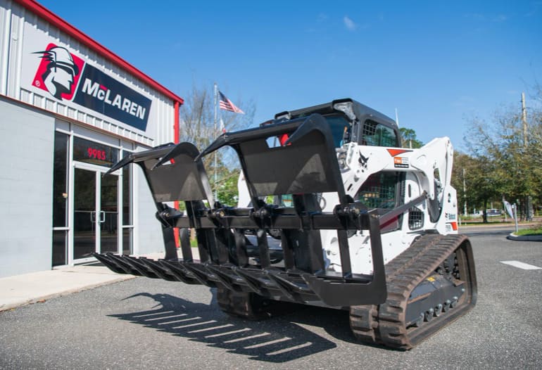 hd root grapple bucket wide open on a bobcat skid steer by mclaren