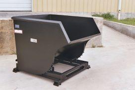 Heavy Duty Self-Dump Hoppers attachment on the ground from Star Industries