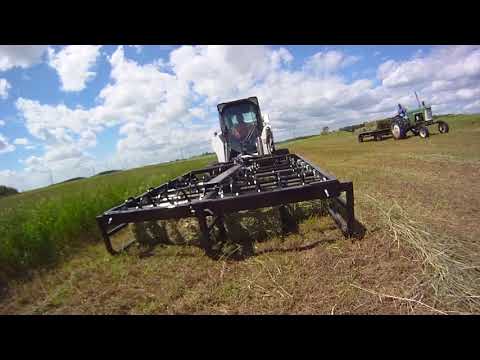 10-Pack Bale Accumulator Grapple in action on the field from Top Dog Attachments