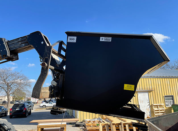 Heavy Duty Self-Dump Hoppers attachment ready to action by Star Industries