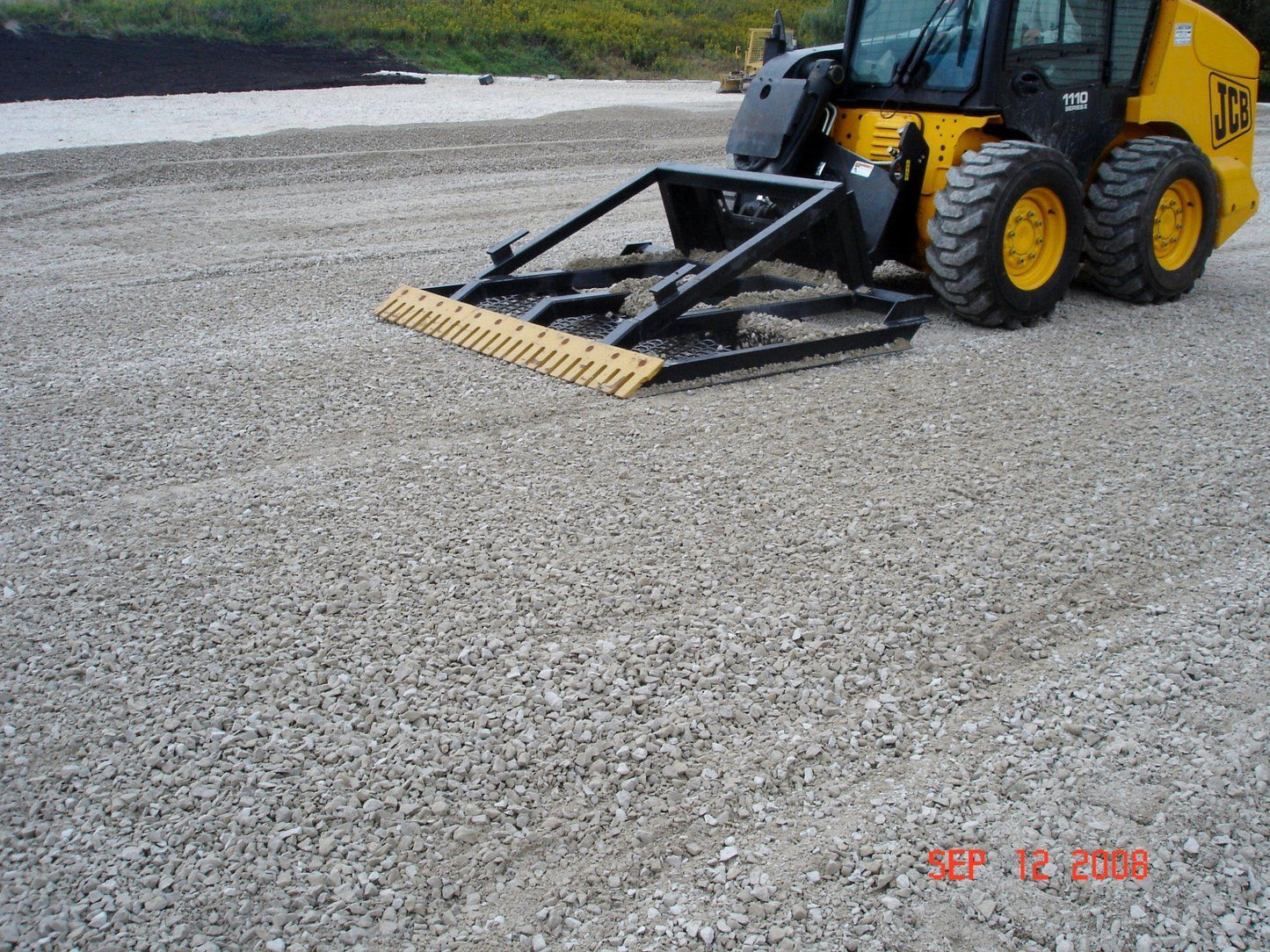 land plane for tractor and skid steer in action on the field from berlon