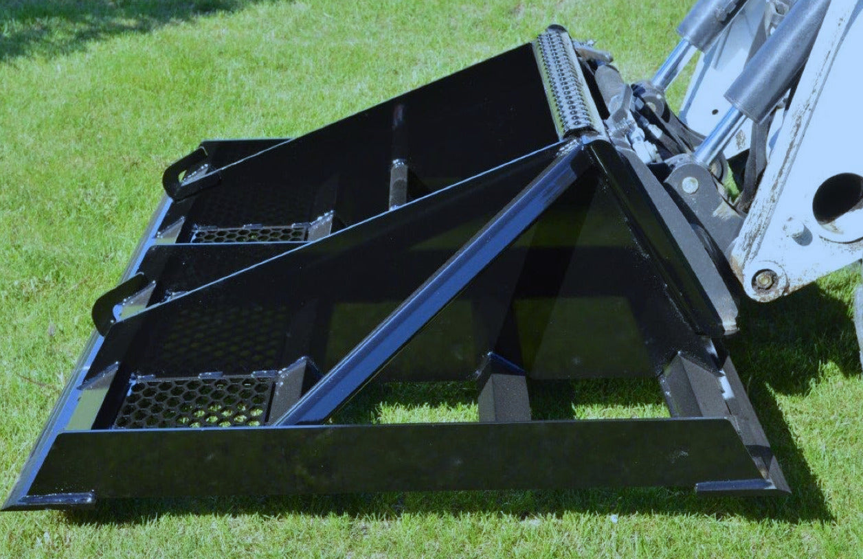 bobcat skid steer with the land plane side view in action