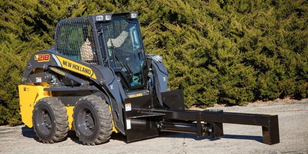 New Holland Skid Steer with the Log Splitter attachment from Berlon