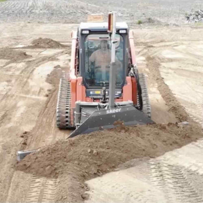 skid steer with the skeer system grader in action