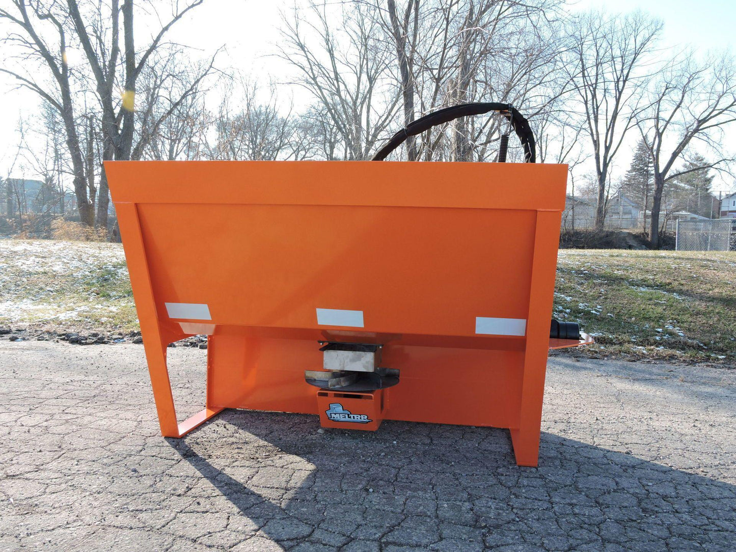 Meltrr - Salt Spreader attachment from Berlon Industries on the ground