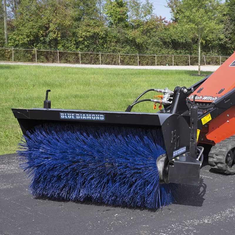 mini skid steer with blue diamond hd broom attachment