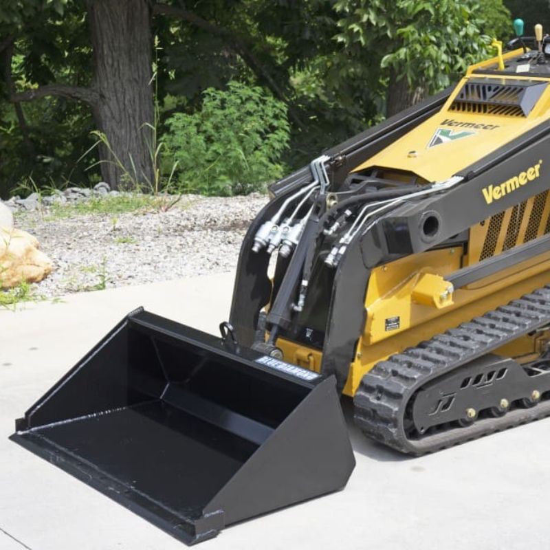 vermeer mini skid steer with the blue diamond low profile bucket with smooth edge attachment