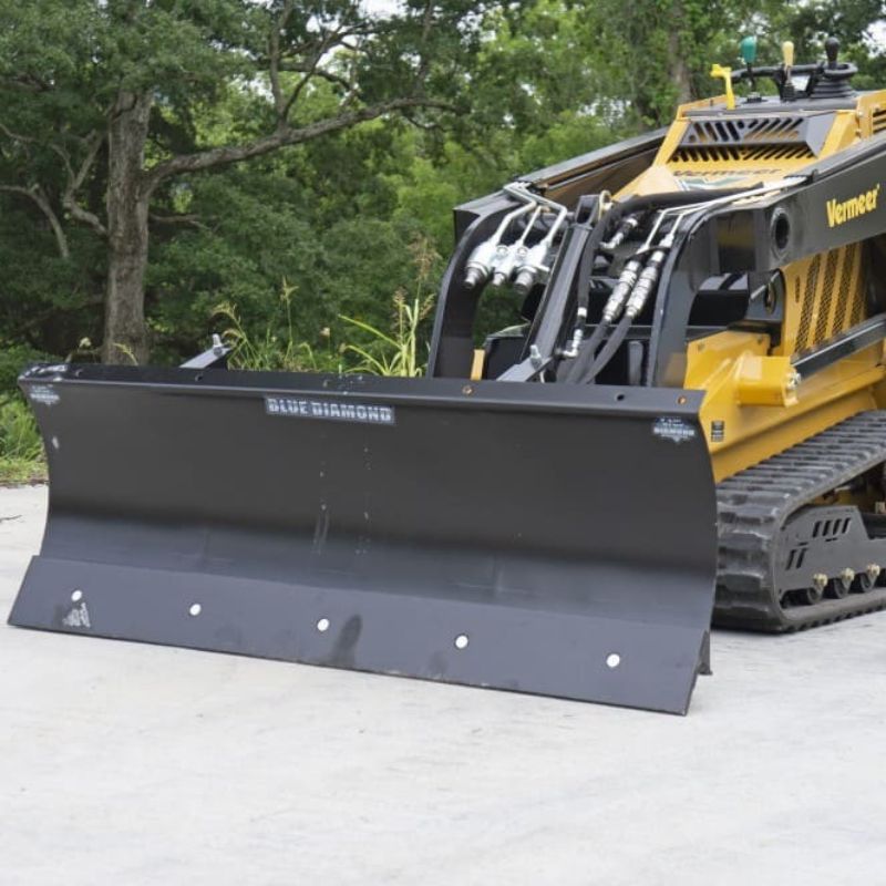 vermeer mini skid steer in action with the blue diamond mini multi blade attachment