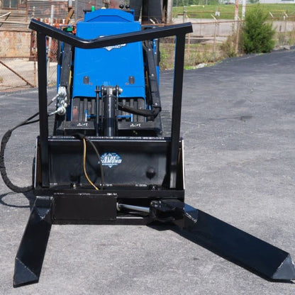 mini skid steer ready to action with the blue diamond mini nursery forks