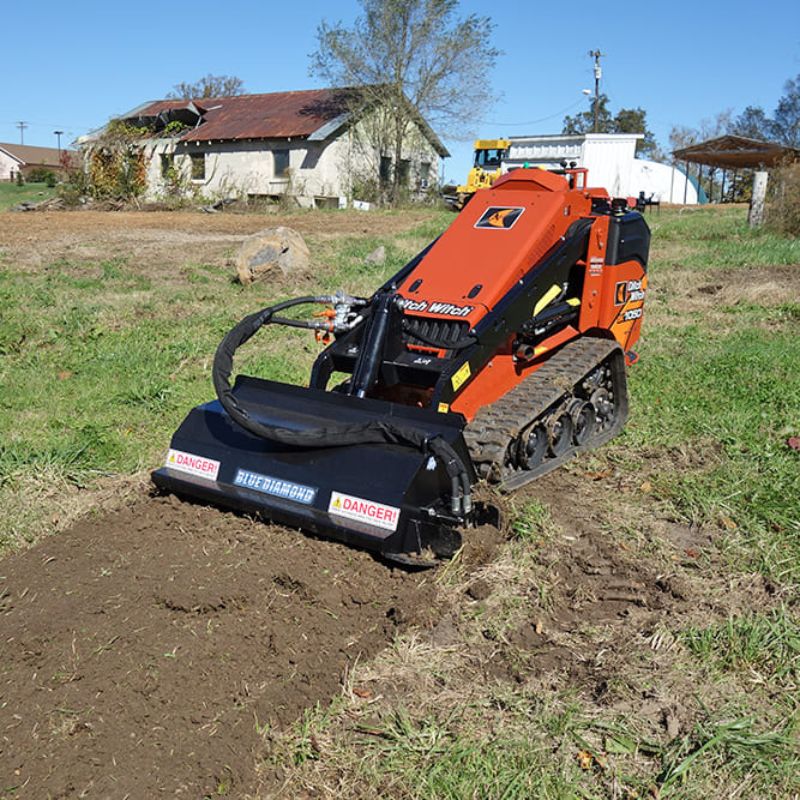 ditch witch mini skid steer with the mini rototiller attachment