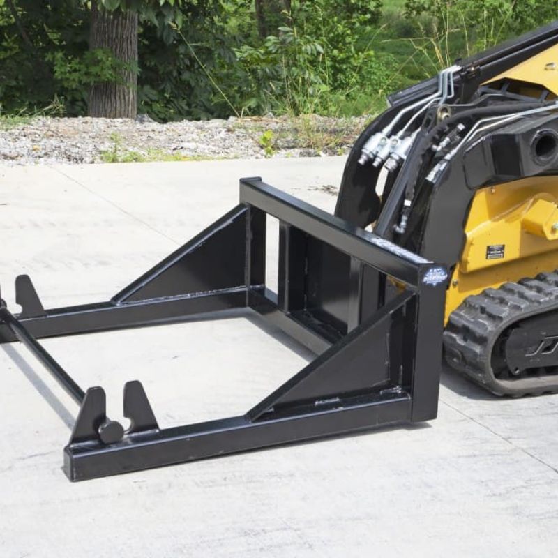 vermeer mini skid steer with the blue diamond mini sod roller