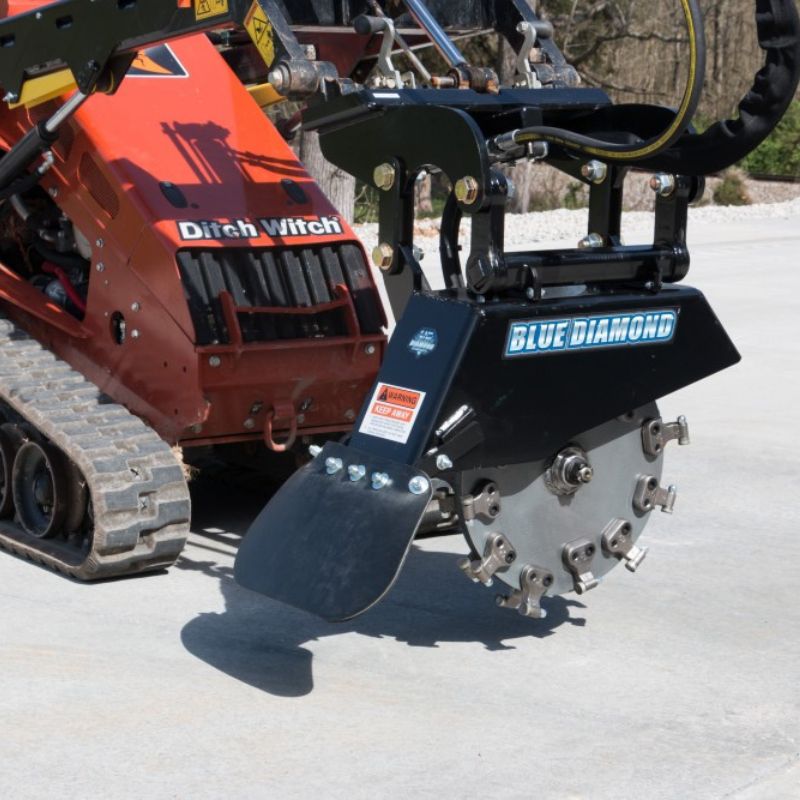 ditch witch mini skid steer with blue diamond mini stump grinder