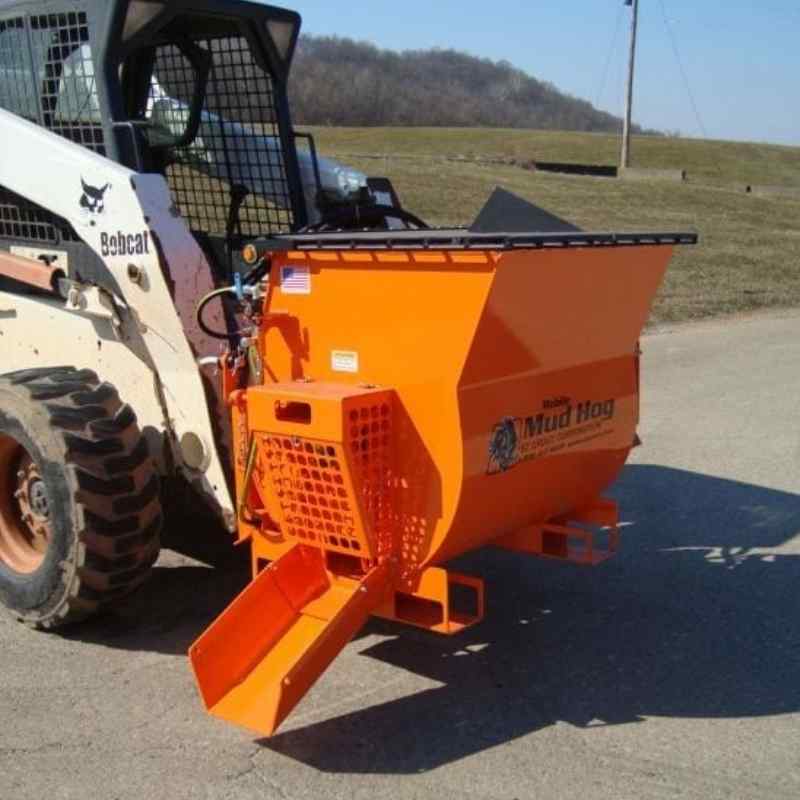 bobcat skid steer with the concrete mixer and dispenser  attachment from ezg manufacturing