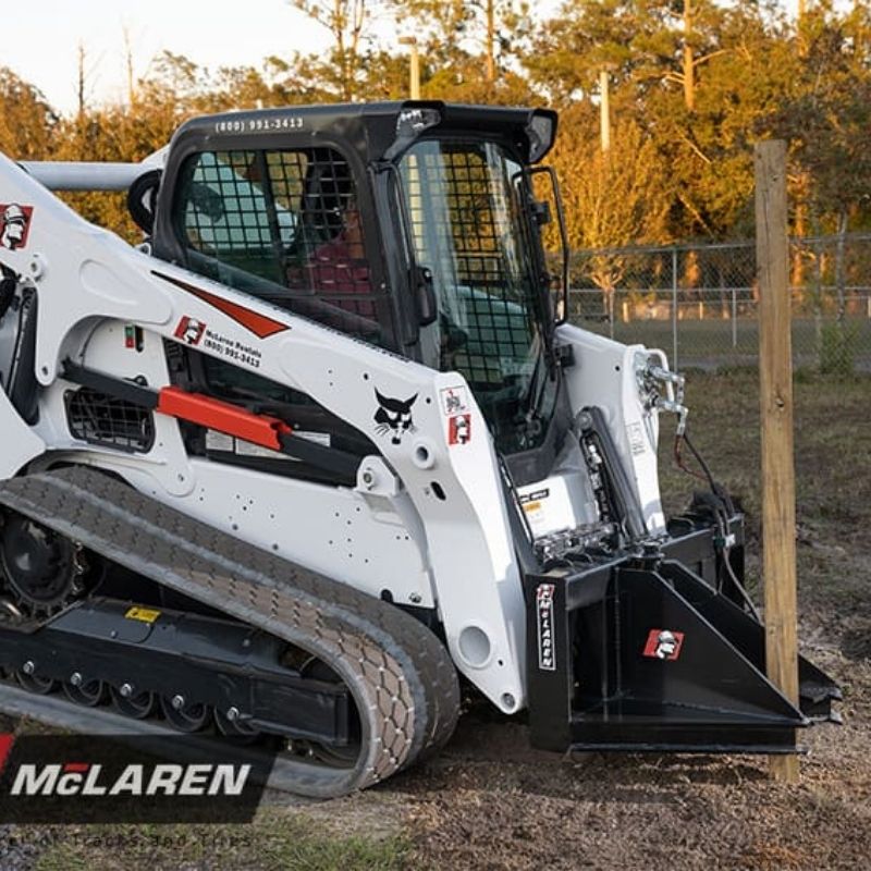 bobcat skid steer with Post and Tree Puller attachment from McLaren Industries