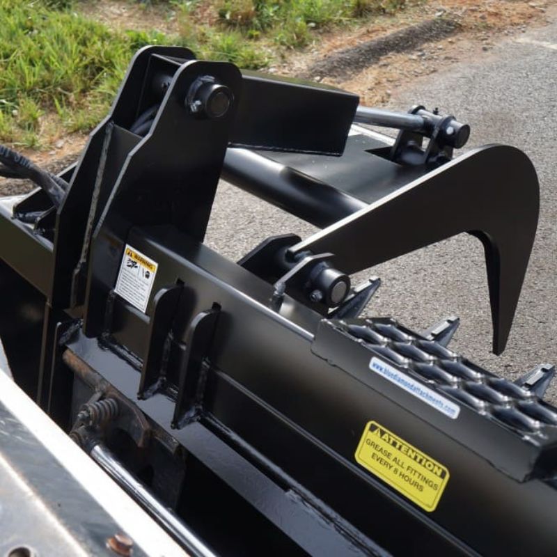 Close Up of left hydraulic clamp on Blue Diamonds Severe Duty Root Grapple