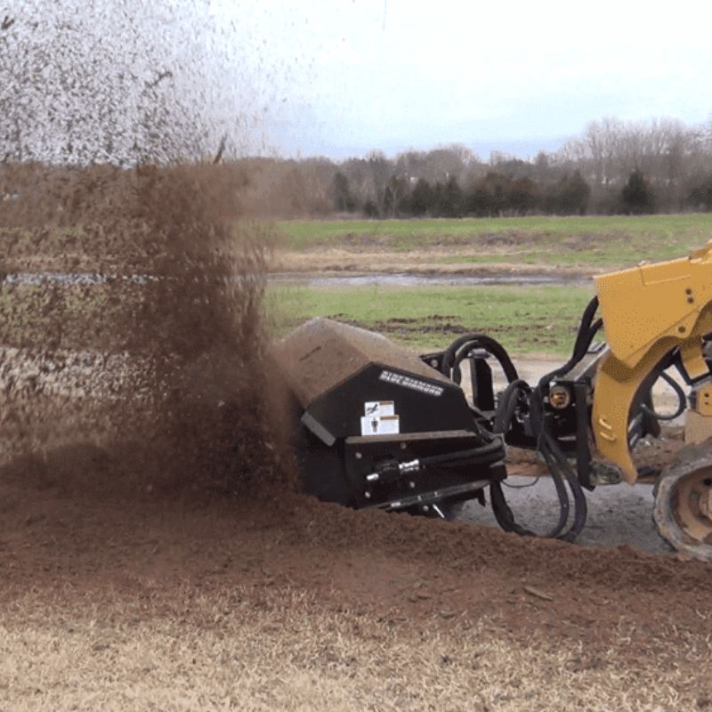 cat skid steer sweeper attachment of blue diamond