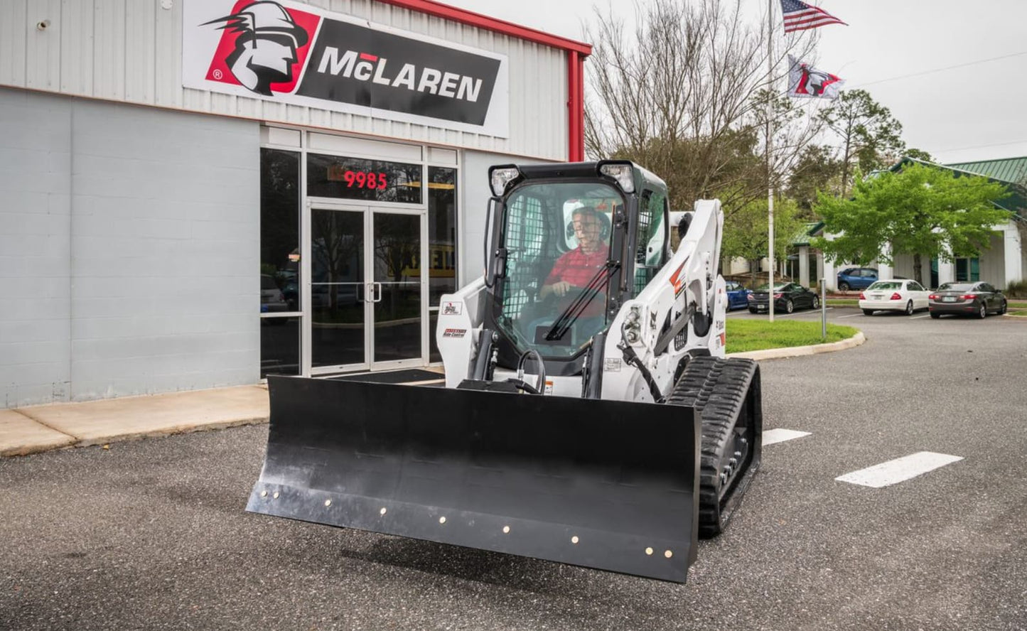 6 way dozer blade with tilt attachment by mclaren industries on a bobcat skid steer