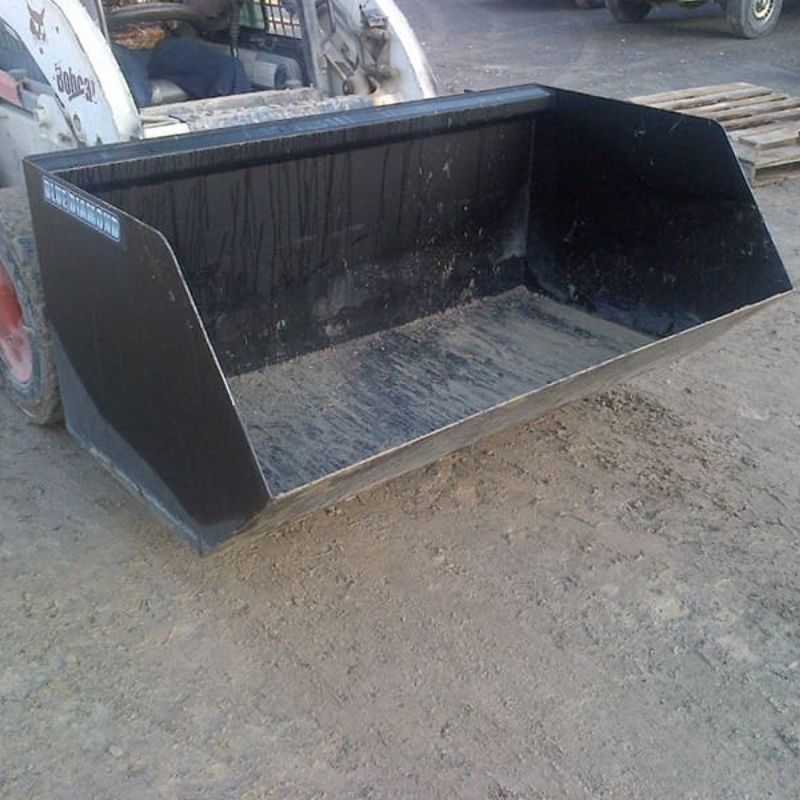 blue diamond dumpster bucket for skid steer in action.