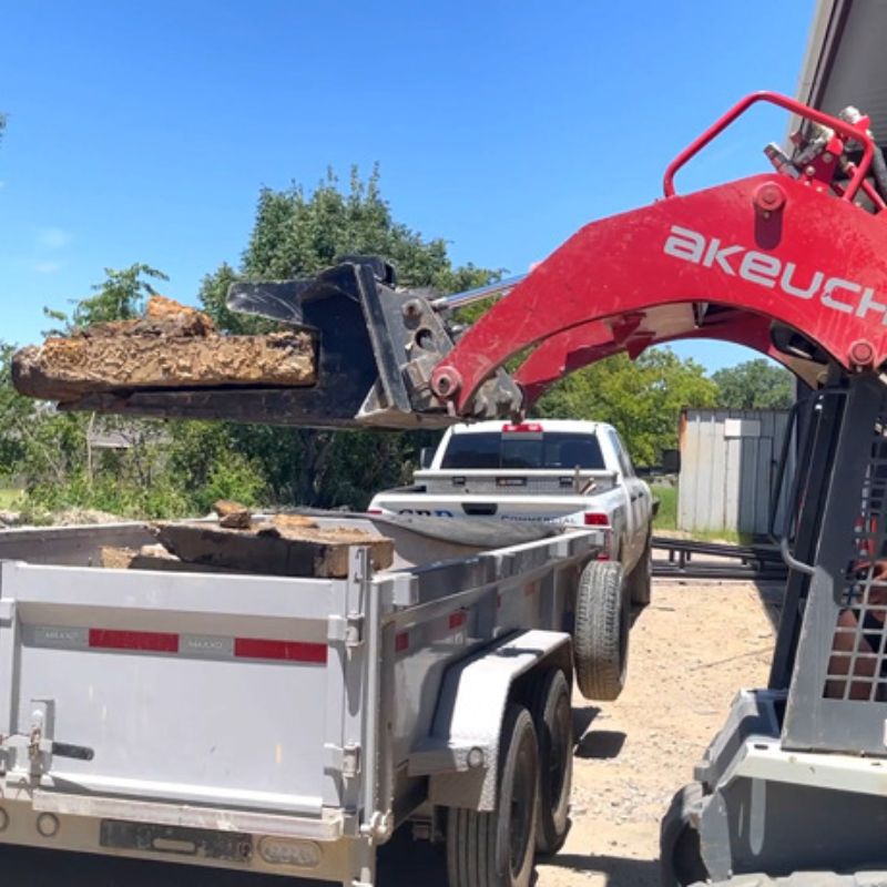 Takeuchi moving with the star industries slab eater attachment