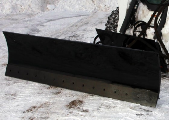 snow blade attachment in the snow field by top dog attachments