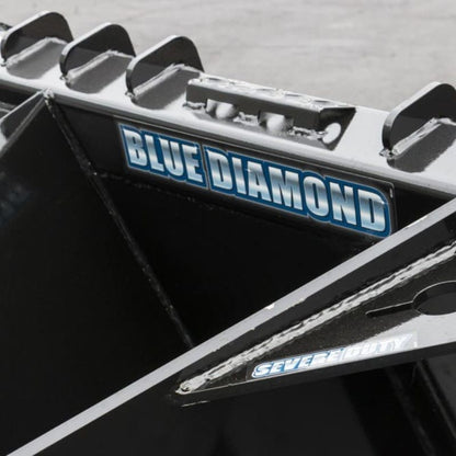 blue diamond stump bucket attachment up close.