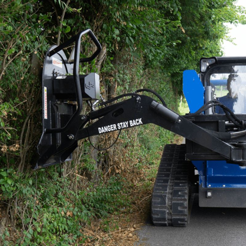 cutting bushes with the swing arm brush cutter attachment from blue diamond