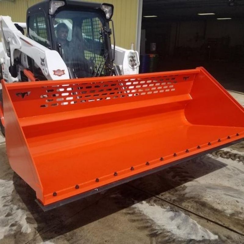 bobcat skid steer with the utility bucket from tm manufacturing