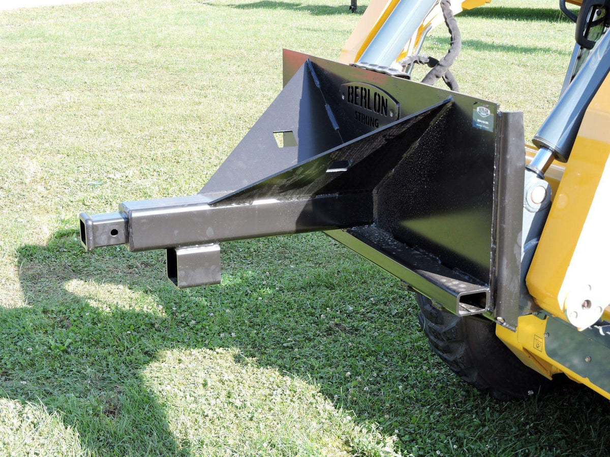 Skid Steer with the Trailer Mover in the field from Berlon Industries 