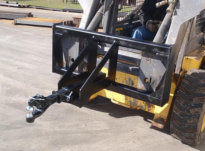 Star Industries Trailer Spotter  ready to action on a skid steer