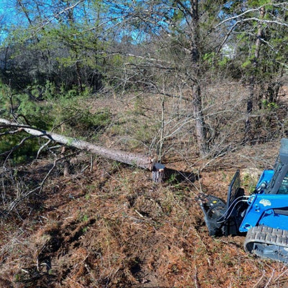 blue diamond tree shear attachment in action