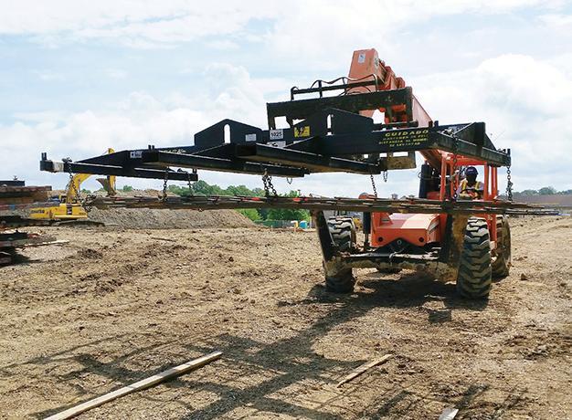 Telehandler with the Wire Mesh Handlers attachment from Star Industries 
